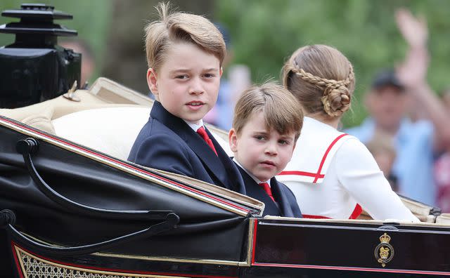 <p>Neil Mockford/Getty </p> Prince George and Prince Louis at Trooping the Colour 2023