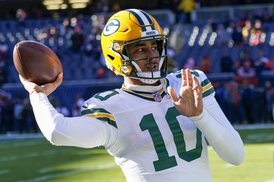 Green Bay Packers' Jordan Love warms up before an NFL football game against the Chicago Bears Sunday, Dec. 4, 2022, in Chicago. (AP Photo/Charles Rex Arbogast)