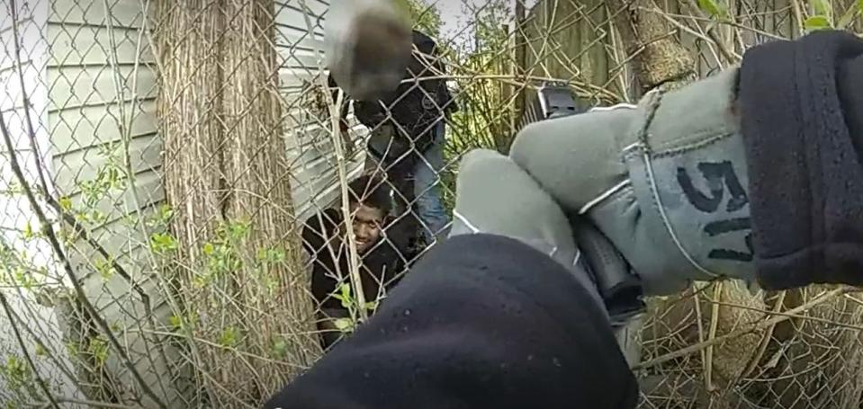 Rodriguez Fitzgerald, 22, is seen in this still photo taken from the body camera footage of Columbus police SWAT officer Rodney Mayberry on Sunday outside a home in North Linden.  The two men exchanged gunfire outside the home before Fitzgerald was wounded and taken into custody. No police officers were injured in the shooting.