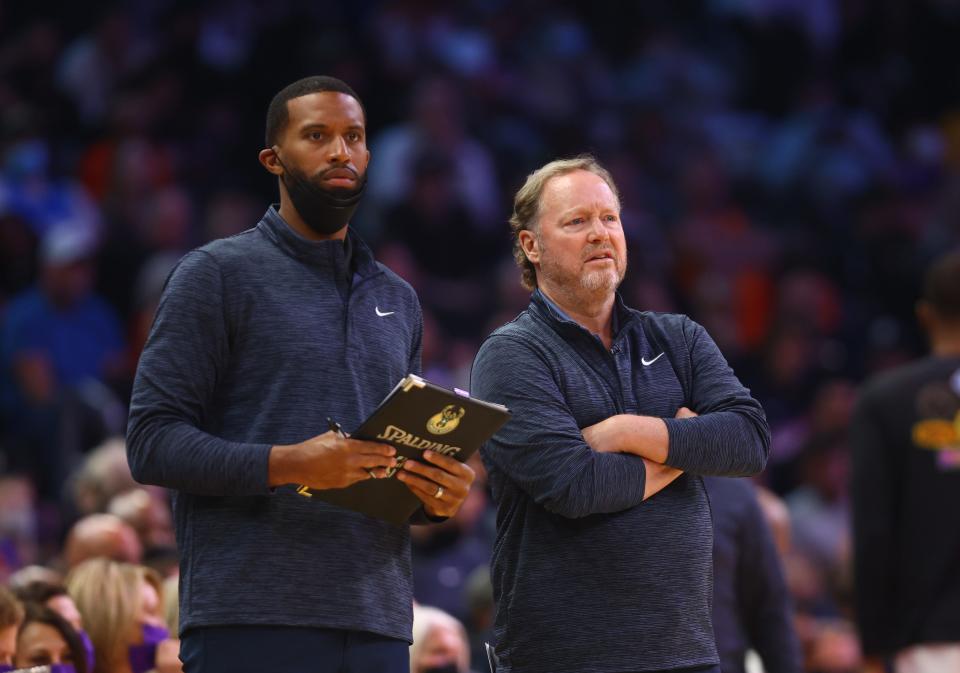 Charles Lee (right) and Mike Budenholzer are potential candidates for the Phoenix Suns' head coaching job, should the NBA team fire Frank Vogel.
