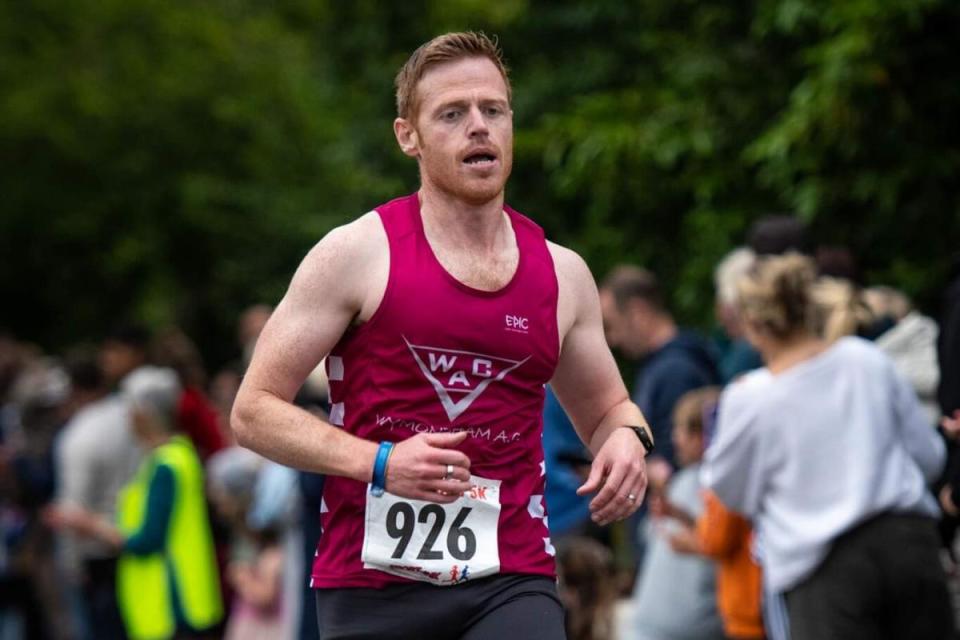 Mark Armstrong runs down the home straight at the Wroxham 5K on Wednesday night <i>(Image: Dreampace)</i>