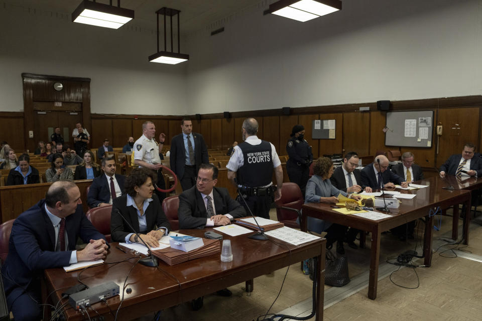 Prosecuting and Defense attorneys wait during the sentencing of the Trump Organization at Manhattan Criminal Court on Friday, Jan. 13, 2023, in New York. (Adam Gray/DailyMail via AP, Pool)