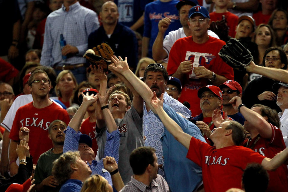 ARLINGTON, TX - OCTOBER 23: A ball goes into the stands during Game Four of the MLB World Series between the St. Louis Cardinals and the Texas Rangers at Rangers Ballpark in Arlington on October 23, 2011 in Arlington, Texas. (Photo by Ronald Martinez/Getty Images)