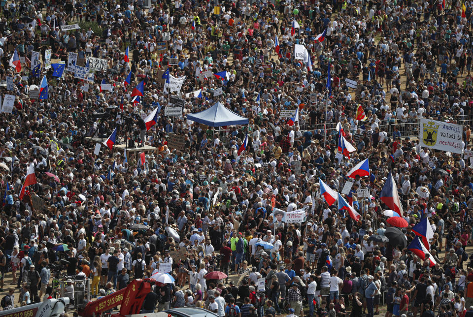 People gather for a protest in Prague, Czech Republic, Sunday, June 23, 2019. Protesters are on calling on Czech Prime Minister Andrej Babis to step down over fraud allegations and subsidies paid to his former companies. (AP Photo/Petr David Josek)