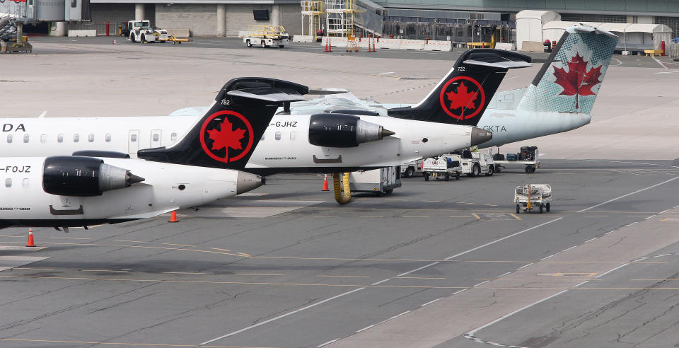Toronto, ON- September 25  -  Air Canada planes sit on the tarmac at the airport.  Passengers arriving on international flights go through COVID-19 testing at terminal 3 at Toronto Pearson International Airport  in Toronto. September 25, 2021.        (Steve Russell/Toronto Star via Getty Images)