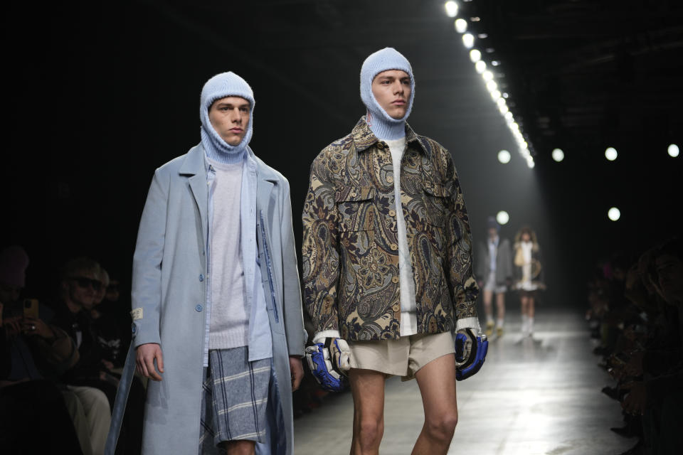 Models wear creations as part of the Family First menswear Fall-Winter 2023-24 collection presented in Milan, Italy, Friday, Jan. 13, 2023. (AP Photo/Luca Bruno)