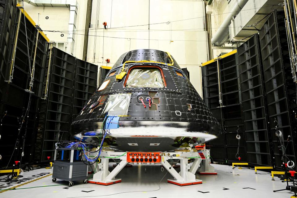The Artemis II Crew Module is seen inside the Neil Armstrong Operations and Checkout Building at the Kennedy Space Center in Cape Canaveral, Florida.