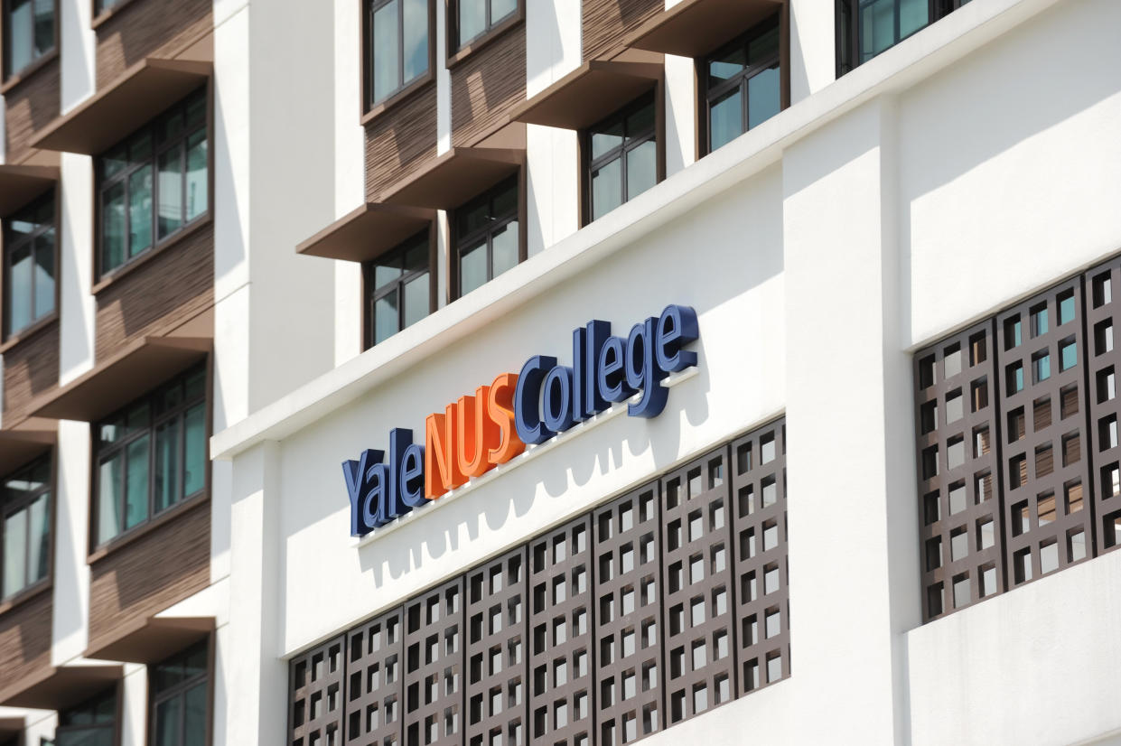 A view of Yale-NUS College sign on the temporary building next to where the main building is under construction and will be completed in year 2015 in Singapore on August 27, 2013. Yale-NUS College is Singapore's first liberal arts college with a full residential program, with the first cohort comprising 155 students. AFP PHOTO/ROSLAN RAHMAN        (Photo credit should read ROSLAN RAHMAN/AFP/Getty Images)