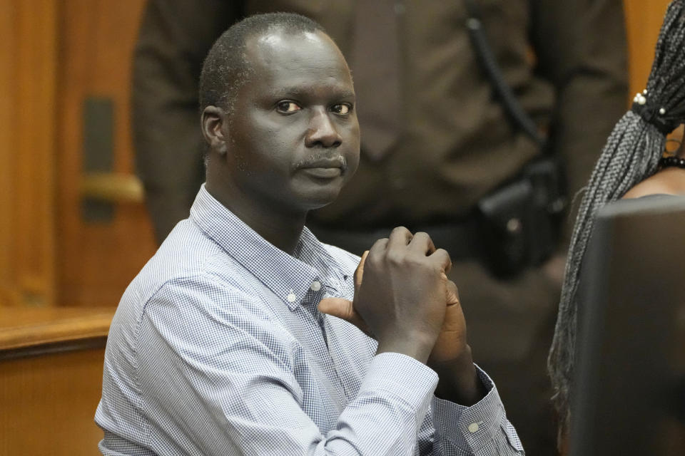 Bul Mabil, brother of Dau Mabil, a 33-year-old Jackson, Miss., resident who went missing on March 25 and whose body was found in April floating in the Pearl River in Lawrence County, waits for questioning to resume during a hearing, Tuesday, April 30, 2024 in Jackson, Miss. The hearing is on whether a judge should dissolve or modify his injunction preventing the release of Mabil's remains until an independent autopsy could be conducted. (AP Photo/Rogelio V. Solis)