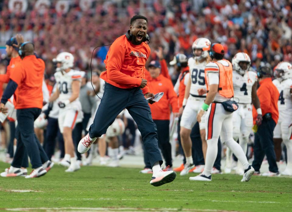 Nov 26, 2022; Tuscaloosa, Alabama, USA; Auburn Tigers head coach Carnell Williams reacts after his team scores against theAlabama Crimson Tide at Bryant-Denny Stadium. Mandatory Credit: Marvin Gentry-USA TODAY Sports