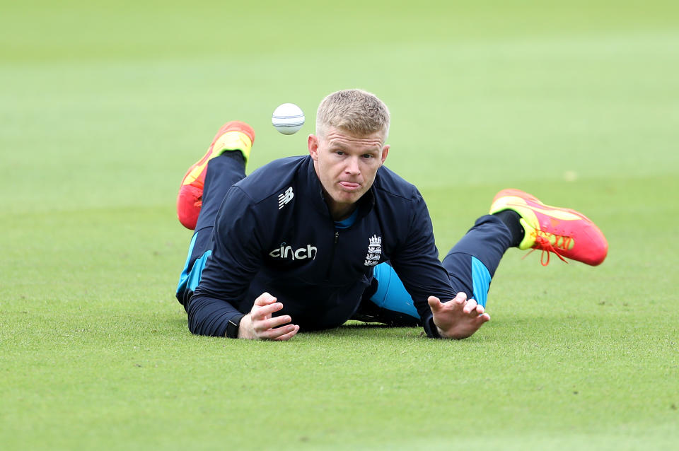 <p>England's Sam Billings attempts to catch the ball during the nets session at Sophia Gardens, Cardiff. Picture date: Monday June 21, 2021.</p>

