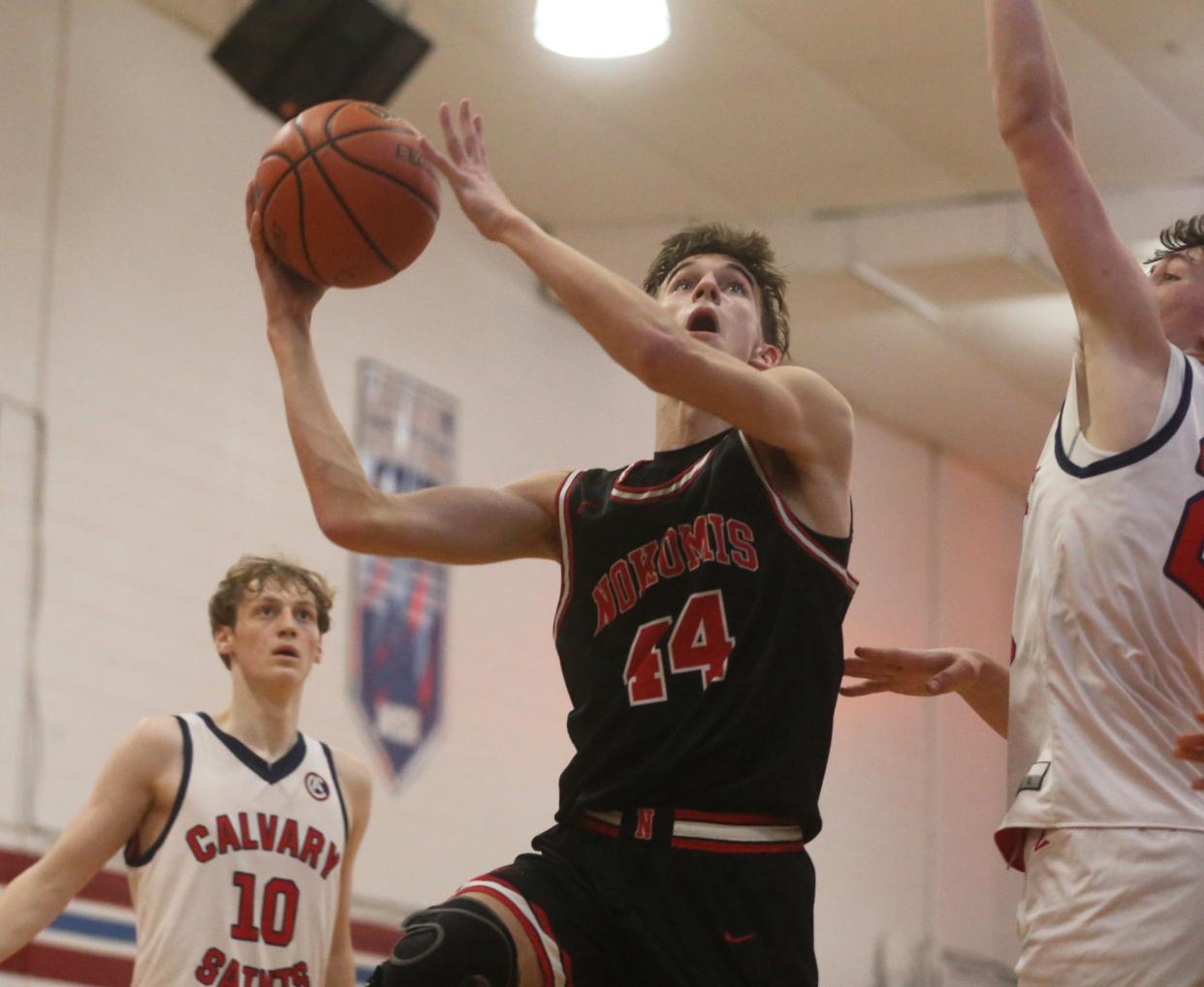 Nokomis' Reece Lohman goes up for a shot against Calvary during an MSM Conference boys basketball game on Friday, Feb. 2, 2024.