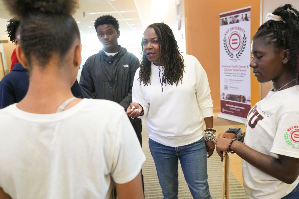 Columbus Urban League CEO Stephanie Hightower speaks to a group of students before their graduation ceremony for the WRT University Career & CULture Experience summer program. The program, aimed at youth ages 14-18, includes in-person and hybrid career exploration and development. Among its efforts, the Urban League hopes to increase the diversity of a variety of industries throughout Greater Columbus.