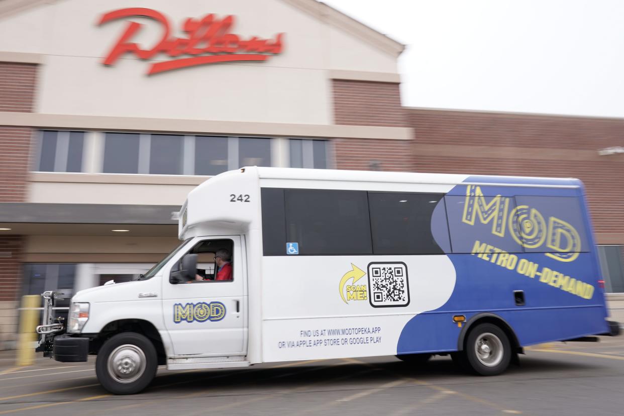 Quinten Bailey, driver of a Topeka Transit "Metro On-Demand" bus, leaves Dillons in east Topeka Wednesday afternoon after picking up a passenger using the service. For a fare of $2, any customer can requests a ride within the coverage area.