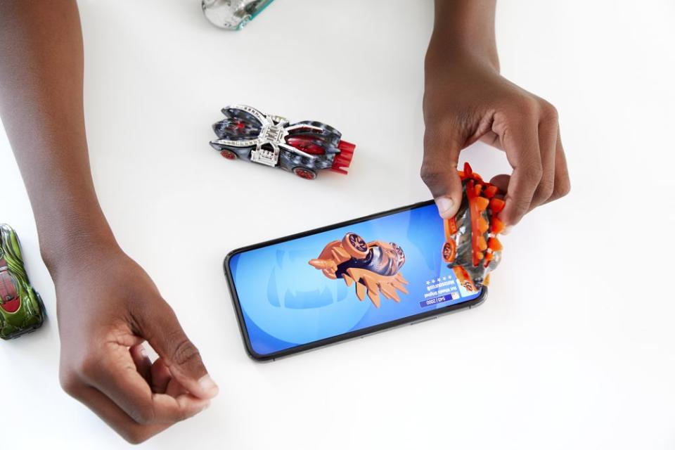 Mattel's biggest launch of the year includes better track, cooler cars, and a way for kids to blend video games with IRL play.