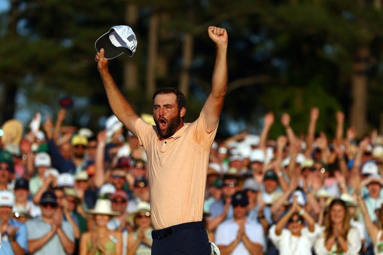 Top-ranked Scottie Scheffler of the United States celebrates on the 18th green after winning the 88th Masters for his second green jacket (Maddie Meyer)