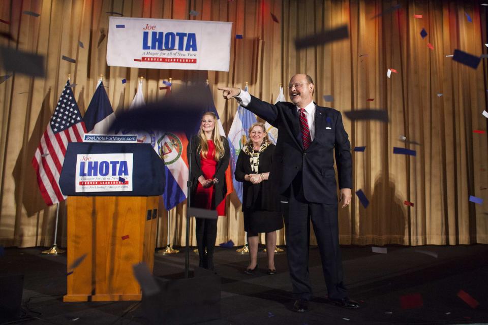 Republican Mayoral candidate Joe Lhota speaks after winning the Republican nomination for New York City mayor as his wife Tamara (C) and daughter Kathryn (L) look on in New York, September 10, 2013. (REUTERS/Keith Bedford)