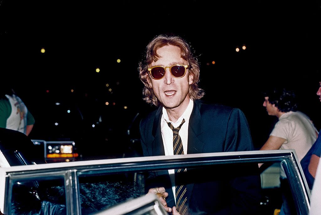 John Lennon arrives at a Times Square recording studio in August 1980 in New York City. (Photo: Vinnie Zuffante/Michael Ochs Archives/Getty Images)