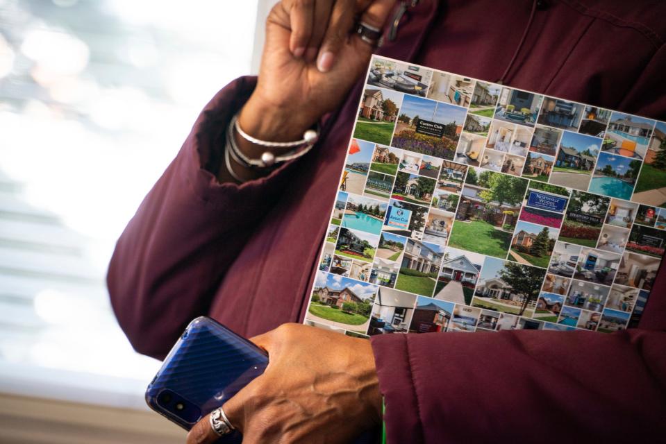 Tonya Hogan, 49, holds a folder with apartment information after completing a housing application at the Carriage Park Apartments in Dearborn on Friday, Feb. 3, 2023. "I have a good feeling about this," said Hogan who rushes to secure housing before her voucher expires on Feb. 13.