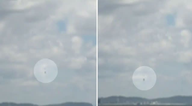 Terrified Gold Coast beach-goers watch as a parachute plummeted into the ocean. Source: 7 News