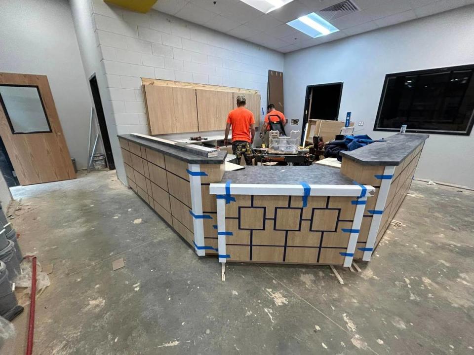 Workers from ICB Construction Group work on the front office of the new Springdale Elementary, which is set to open at the beginning of the 2024-2025 school year.