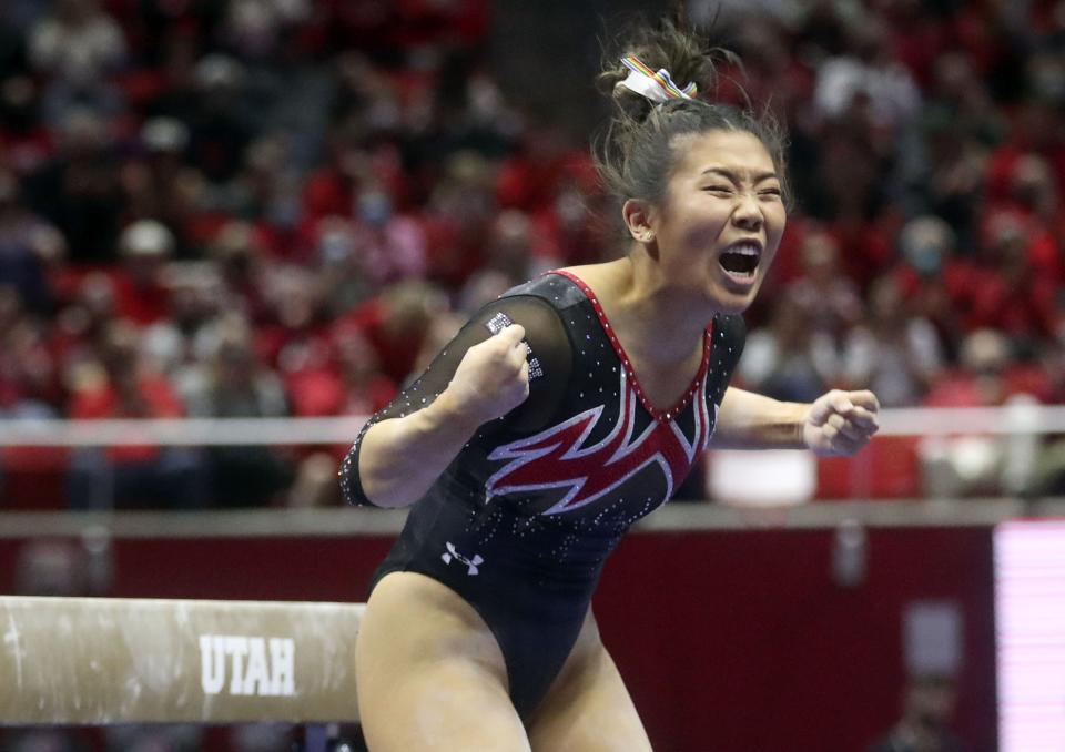 Utah’s Cristal Isa reacts after completing her beam routine, which was a perfect 10.0, as the Utah Red Rocks compete against Oregon State.