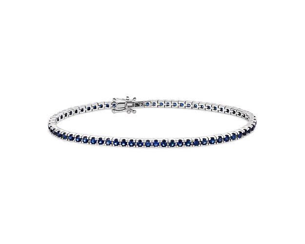 <p><a href="https://go.redirectingat.com?id=74968X1596630&url=https%3A%2F%2Fwww.bluenile.com%2Fjewelry%2Fbracelets%2Fblue-sapphire-tennis-bracelet-in-14k-white-gold-2mm-item-149063%3Fmktg_src_id%3D333001039894284%26ds_k%3Dpla-2237936176798%26device%3Dc%26cq_net%3Dg%26gad_source%3D1%26gclid%3DCj0KCQiAoeGuBhCBARIsAGfKY7x1LKRdy8Evu2in_XsfCpgvb26yR_nFA67-_kJZNOPSjzXTYwSsTzYaAia-EALw_wcB&sref=https%3A%2F%2Fwww.esquire.com%2Flifestyle%2Fg46869506%2F5-year-anniversary-gifts%2F" rel="nofollow noopener" target="_blank" data-ylk="slk:Shop Now;elm:context_link;itc:0;sec:content-canvas" class="link rapid-noclick-resp">Shop Now</a></p><p>Blue Sapphire Tennis Bracelet in 14k White Gold</p><p>bluenile.com</p><p>$3140.00</p>