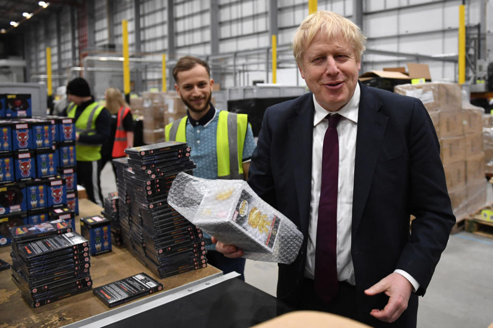 Prime Minister Boris Johnson during a visit to The Hut Group in Burtonwood, Warrington, while on the General Election campaign trail.