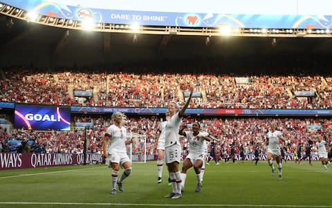 Rapinoe celebrates a goal - Credit: FIFA