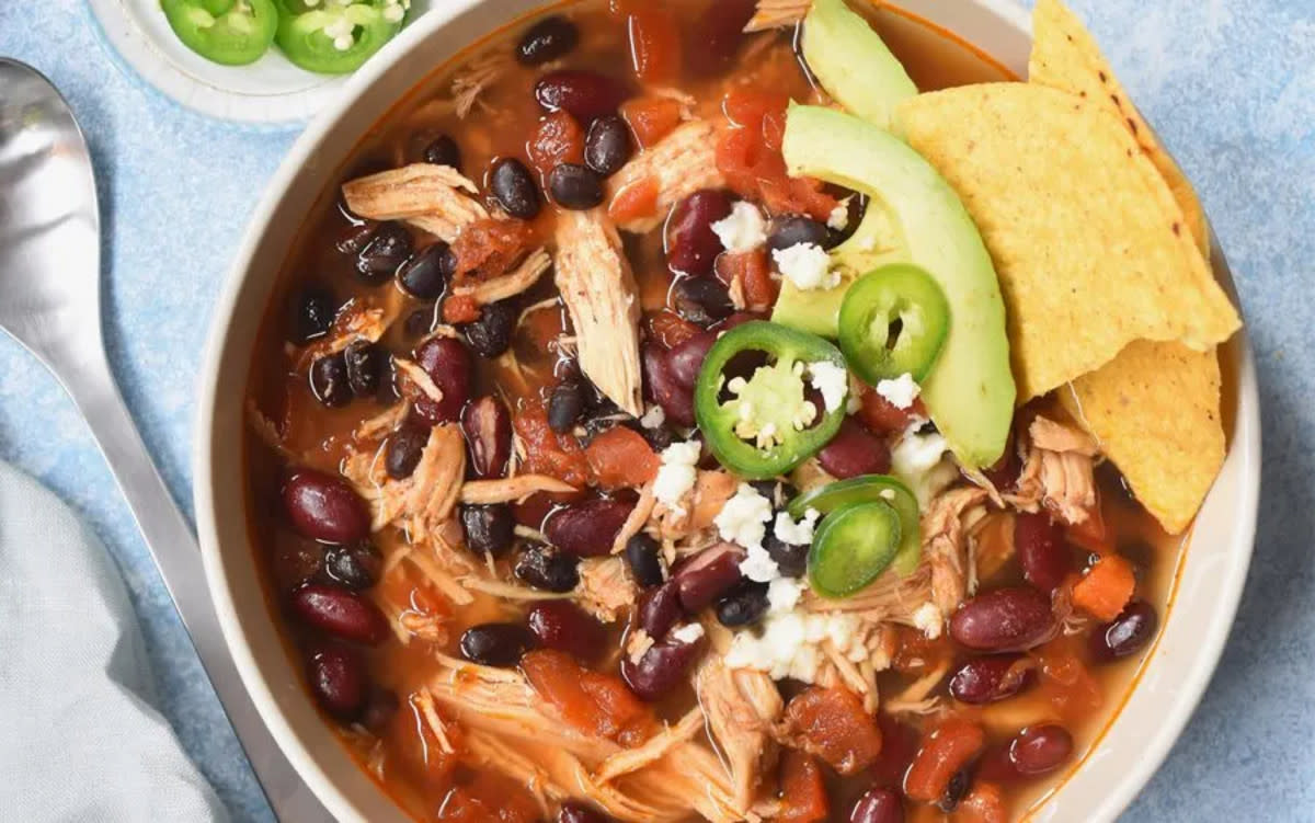 <p>Teresa Blackburn</p><p>This is what you get when you take cheesy, chicken enchiladas and turn it into soup.</p><p><strong>Get the recipe: <a href="https://parade.com/1154137/parade/slow-cooker-chicken-enchilada-soup/" rel="nofollow noopener" target="_blank" data-ylk="slk:Slow Cooker Chicken Enchilada Soup;elm:context_link;itc:0;sec:content-canvas" class="link rapid-noclick-resp">Slow Cooker Chicken Enchilada Soup</a></strong></p>