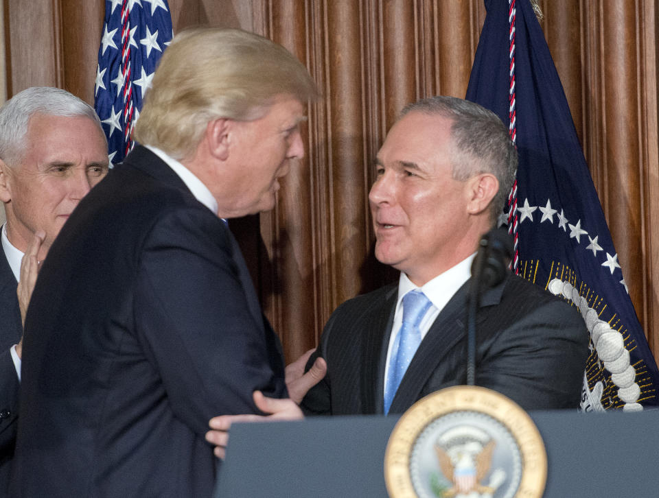 President Donald Trump and his EPA administrator, Scott Pruitt, have both deneid climate change is real. (Photo: Ron Sach/pool photo/Getty Images)