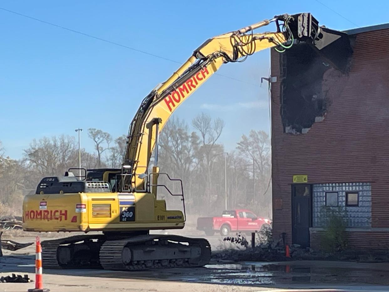 Demolition begins on the old Detroit Department of Transportation Coolidge bus terminal on Thursday.