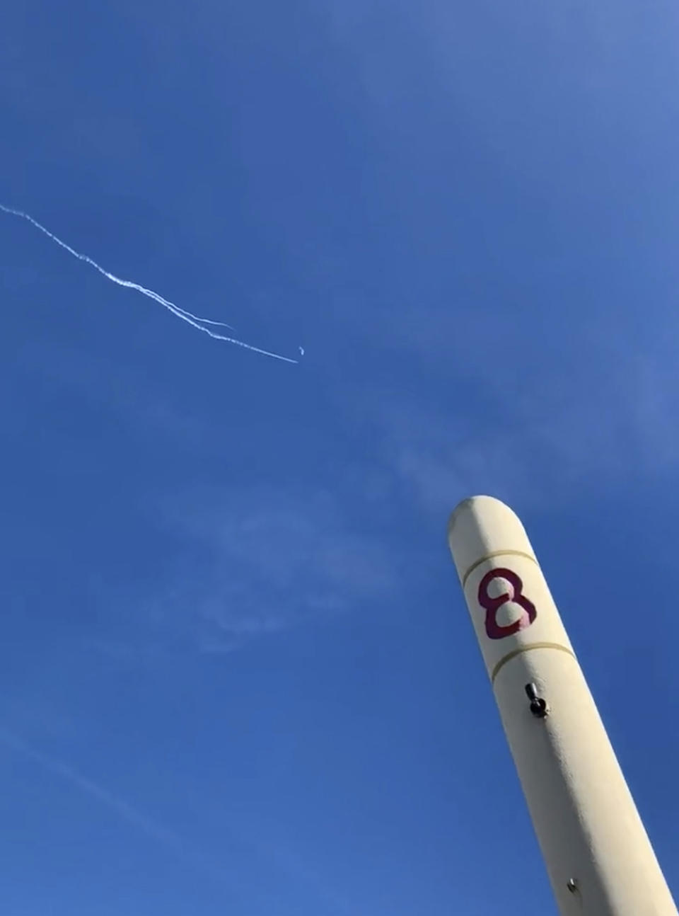 This photo provided by Jason Sellers shows U.S. Air Force fighter aircraft shooting down a suspected Chinese spy balloon off the Carolina coast on Saturday, Feb. 4, 2023. President Joe Biden said on Saturday that he ordered U.S. officials to shoot down the suspected Chinese spy balloon earlier this week and that national security leaders decided the best time for the operation was when it got over water. (Jason Sellers via AP)