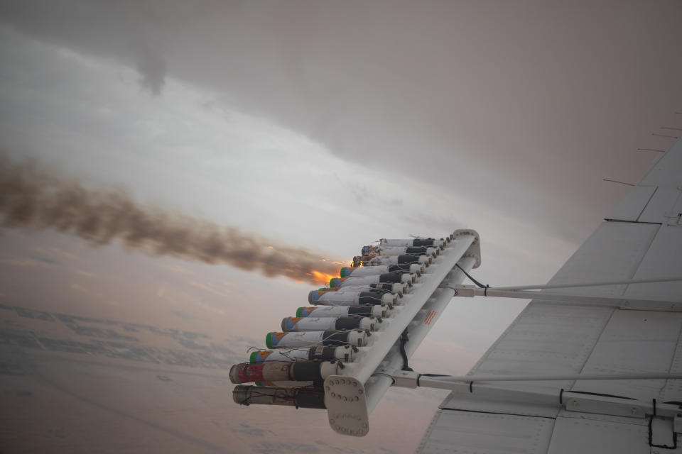 Hygroscopic (water-attracting) salt flares released below a cloud during a routine cloud-seeding mission.