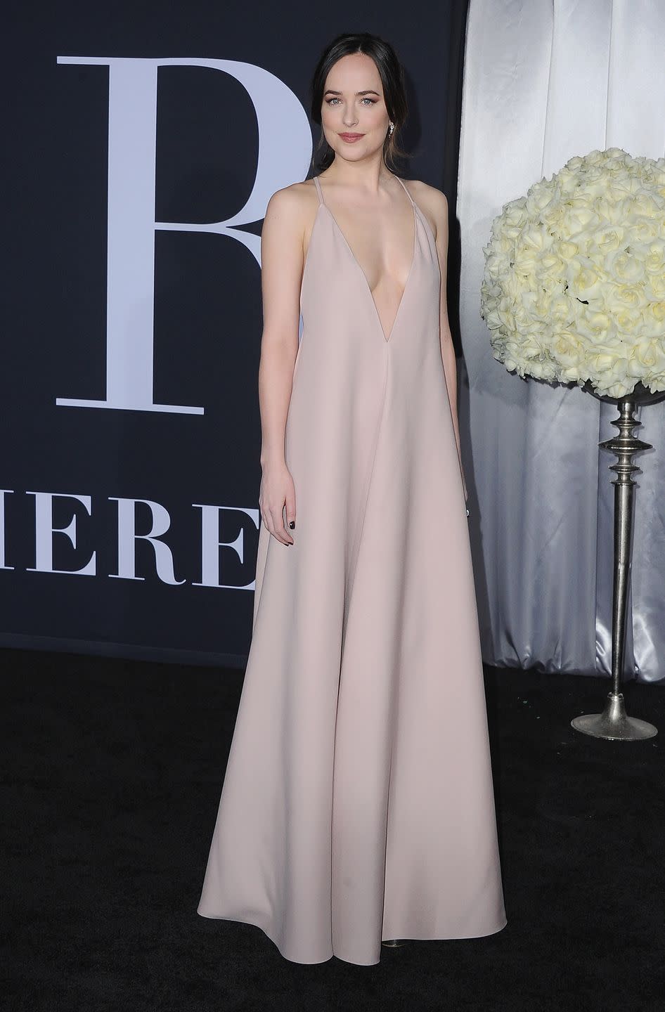 Dakota Johnson Wore a Super Low-Cut Nude Dress That Made Everyone Stop and Stare - Yahoo Life