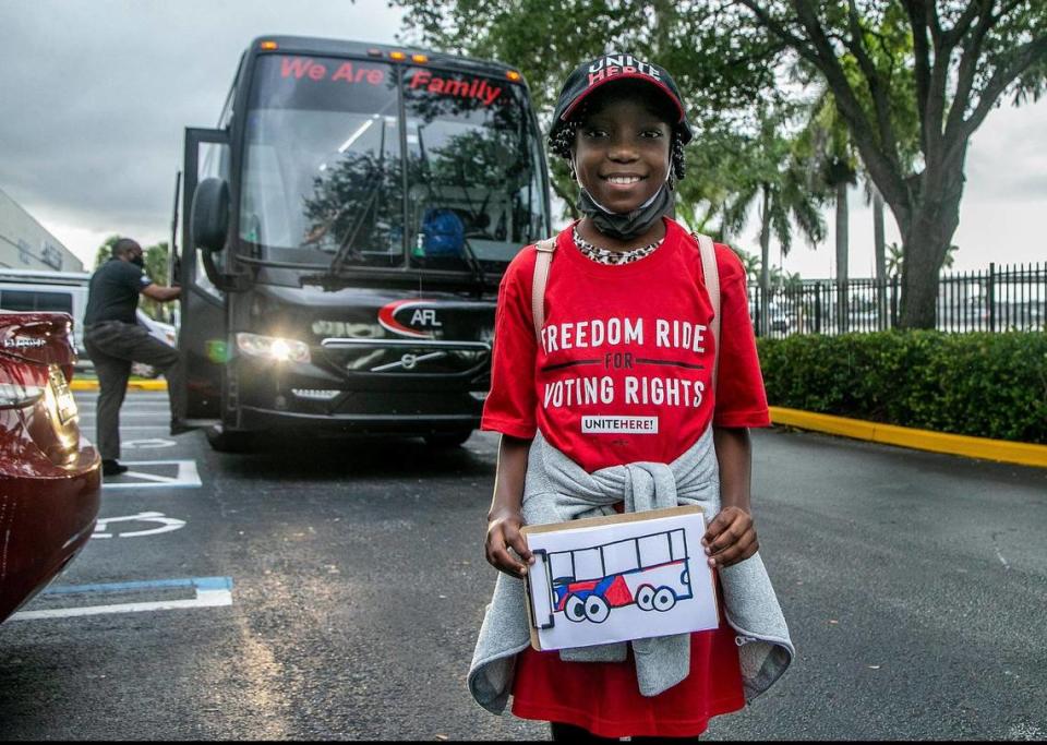 Blessing Decious, displays a bus she drew, before boarding a bus heading to Washington D.C. part of the Freedom Ride for Voting Rights, organized by UNITE HERE Local 355 and Black Voters Matter from Miami Gardens in an effort to encourage the Senate to pass the For The People Act, on Thursday June 24, 2021.