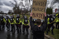 Protesters confront police over the shooting death of Daunte Wright at a rally at the Brooklyn Center Police Department in Brooklyn Center, Minn., Monday, April 12, 20121. (Richard Tsong-Taatarii/Star Tribune via AP)