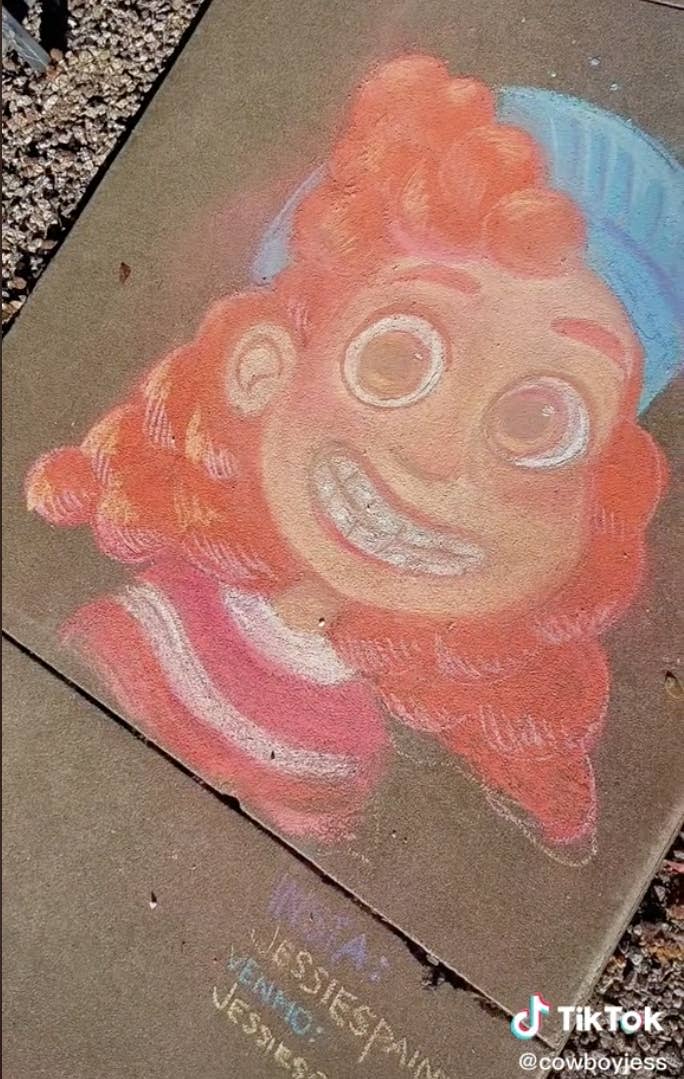 An accurate chalk drawing of a Pixar character on the sidewalk