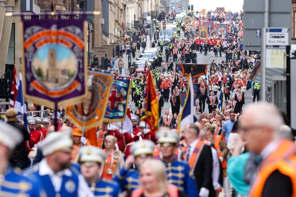 Members of the County Grand Orange Lodge take part in the annual Orange walk parade through the city centre of Glasgow (Robert Perry/PA) (PA Wire)