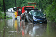 <p>A car is towed off Ruxton Road on Sunday, May 27, 2018, in Towson, Md. (Photo: Jerry Jackson/Baltimore Sun/TNS via Getty Images) </p>