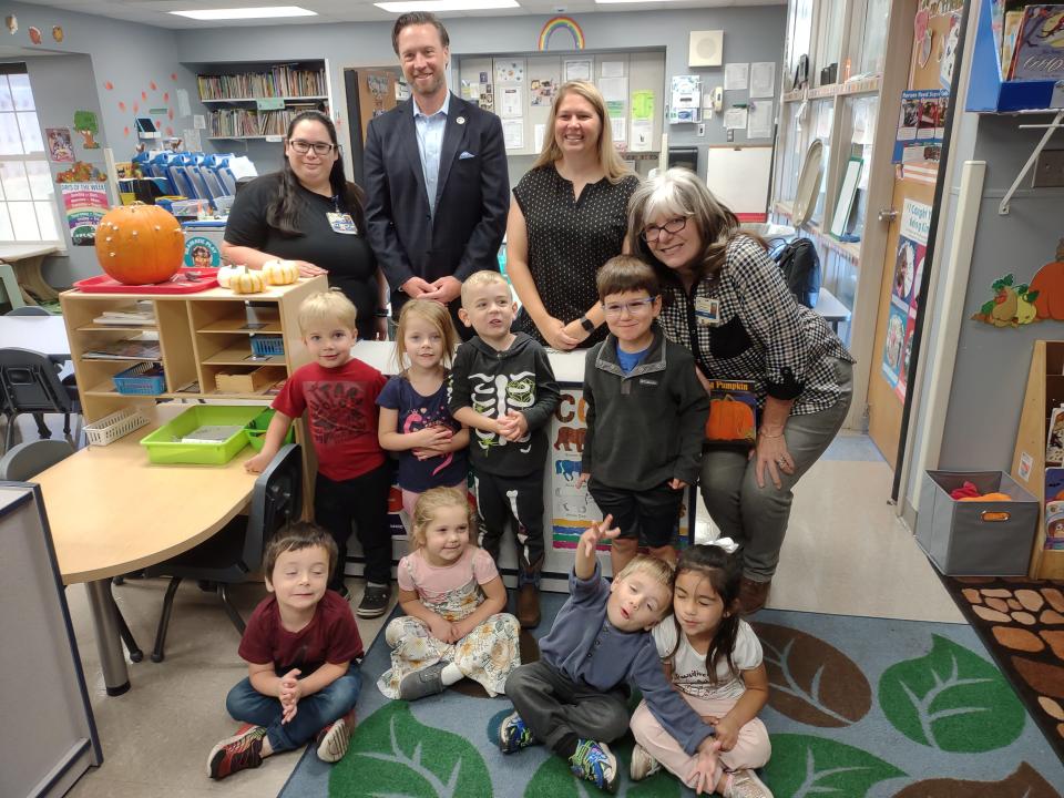 Sen. Lincoln Hough (center left) and Rep.-elect Melanie Stinnett, Republicans from Springfield, in a recent visit to Cox's Early Learning Center. Improving access and costs of child care is expected to be a priority for several lawmakers in the upcoming legislative session.
