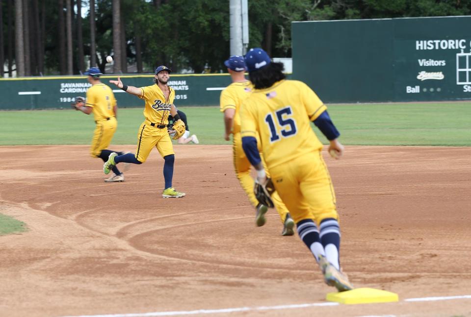 Members of the Savannah Bananas Premier Team warm up before the start of Banana Fest.