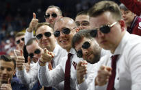 <p>Latvia fans pose for a photo during a Latvia vs. Slovakia game at the Ice Hockey World Championships in Cologne, Germany, May 7, 2017. (Wolfgang Rattay/Reuters) </p>