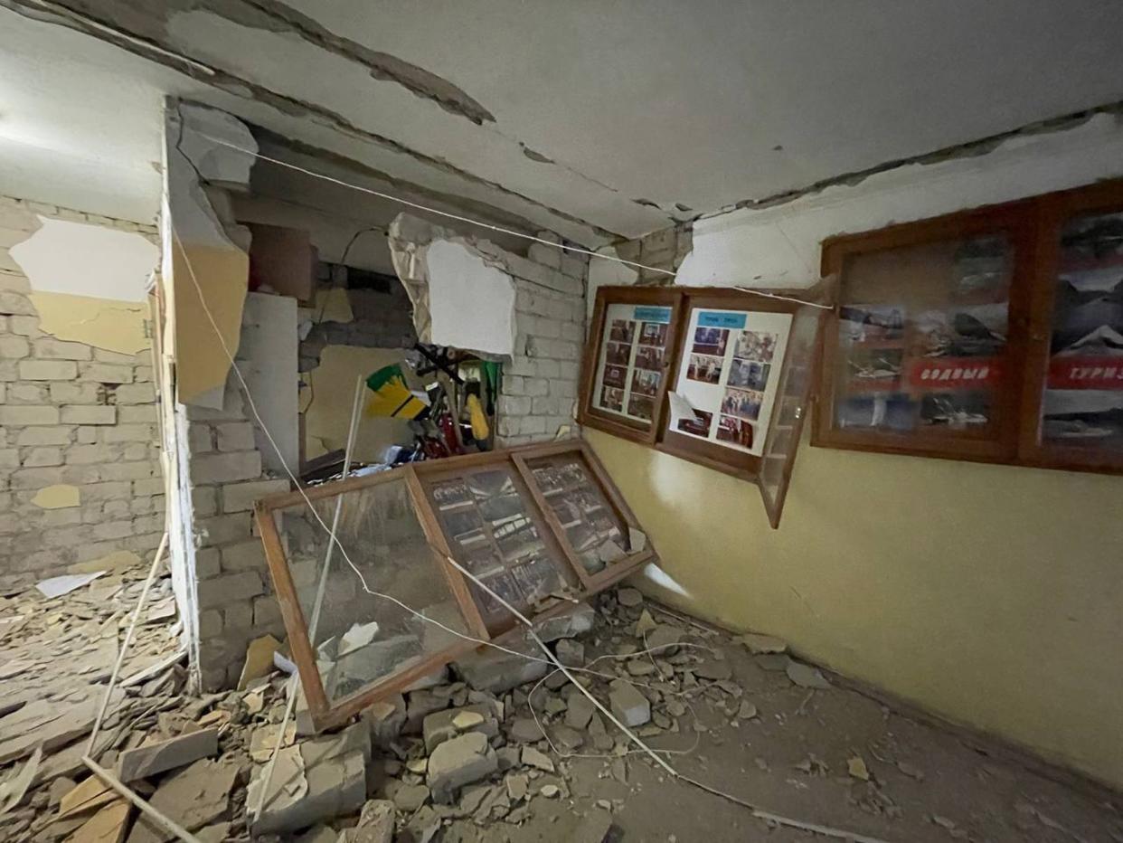 In this photo provided by Yurii Kochubei, a view of the damage after shelling inside a sports complex, in Kharkiv, Ukraine, Saturday, March 5, 2022. An official in one of Ukraine's pro-Russia separatist region says Russian forces will observe a temporary cease-fire Sunday in two Ukrainian cities. An agreement to allow civilians to evacuate collapsed a day earlier amid continued shelling and the flight of refugees to neighboring nations.