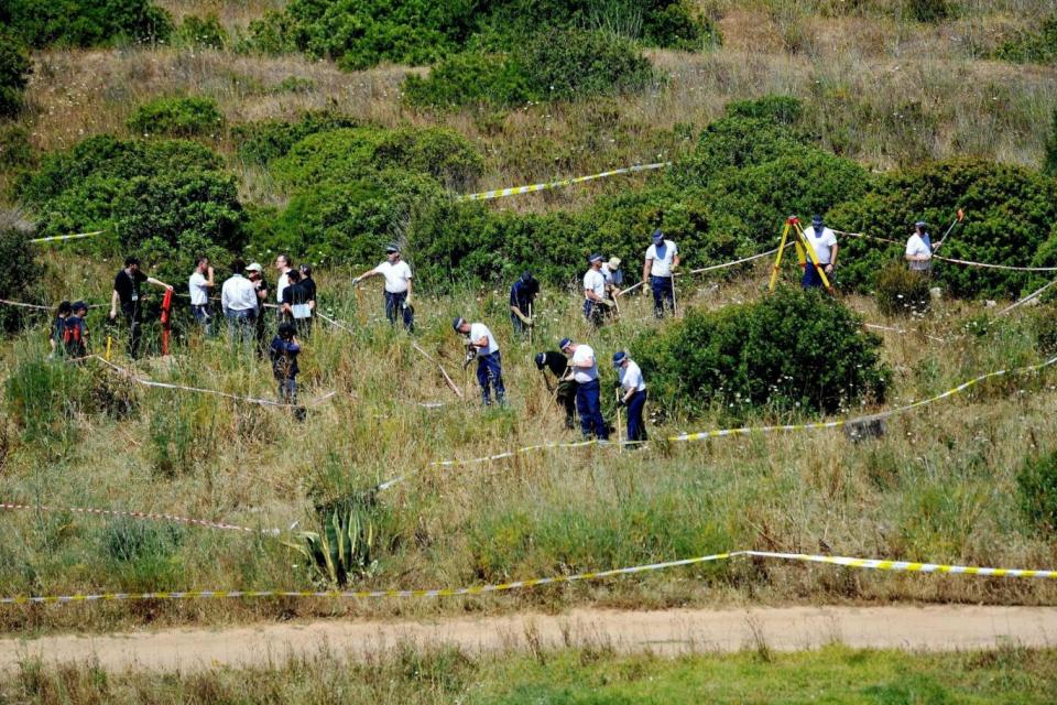 Dig: British police and their Portuguese counterparts investigating the disappearance of Madeleine McCann seven years ago from Praia da Luz (PA)