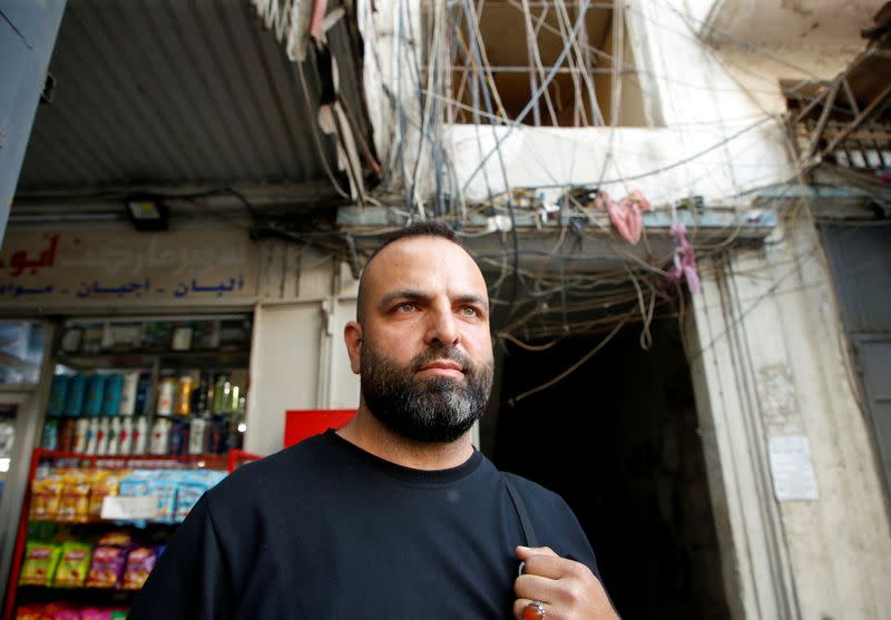 Harrouq speaks during an interview with Reuters in Bab al-Tebbaneh