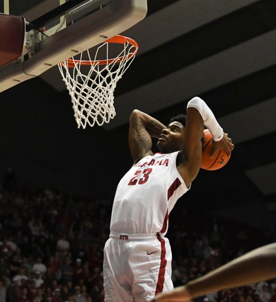 Feb 18, 2023; Tuscaloosa, Alabama, USA; Alabama forward Nick Pringle (23) goes up for a dunk against Georgia at Coleman Coliseum. Alabama defeated Georgia 108-59. Mandatory Credit: Gary Cosby Jr.-USA TODAY Sports