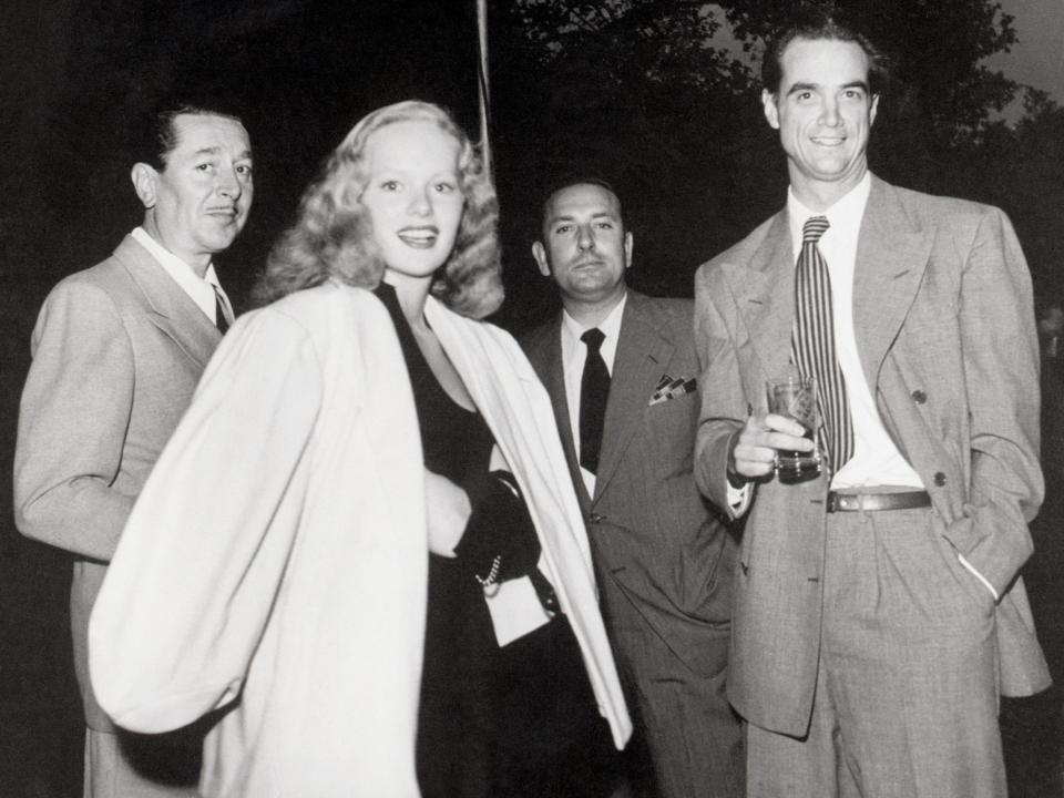 Howard Hughes with actress Peggy Cummins and others in 1930.