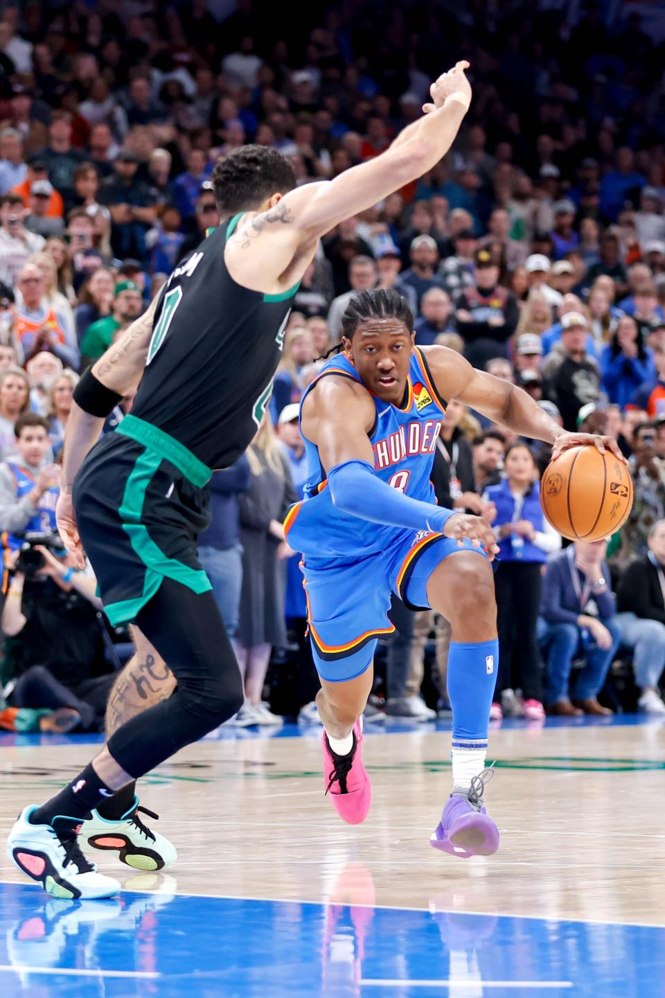 Thunder forward Jalen Williams (8) drives past Celtics forward Jayson Tatum (0) in the fourth quarter at Paycom Center on Jan. 2.