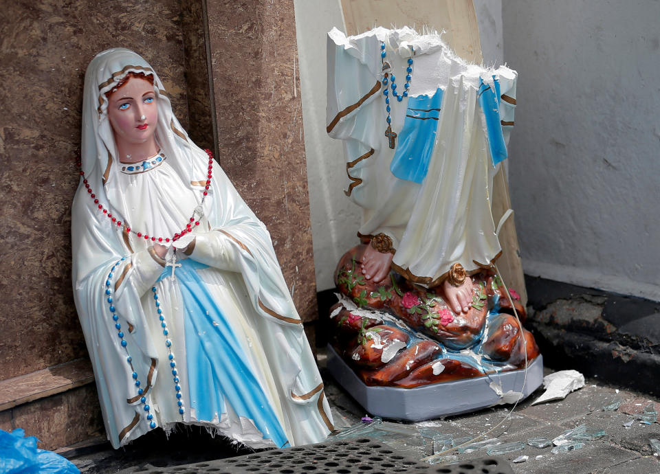 A statue of Virgin Mary broken in two parts is seen in front of the St. Anthony's Shrine, Kochchikade church after an explosion in Colombo, Sri Lanka April 21, 2019. (Photo: Dinuka Liyanawatte/Reuters)